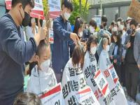 韩国学生削发日本核污水入海 日本政府排污入海决定